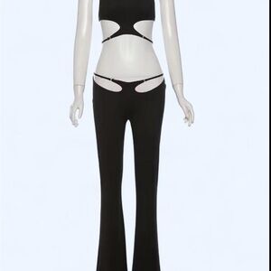 Edgy Black Jumpsuit with Flared Silhouette and Cutout Accents